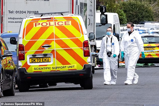 Police and forensic teams on Hart Street, Southport following the stabbing last summer