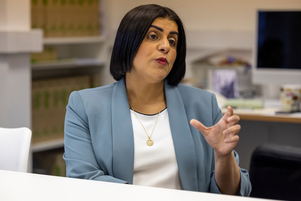 Shabana Mahmood, Home Secretary, speaking in an interview with her right hand raised.