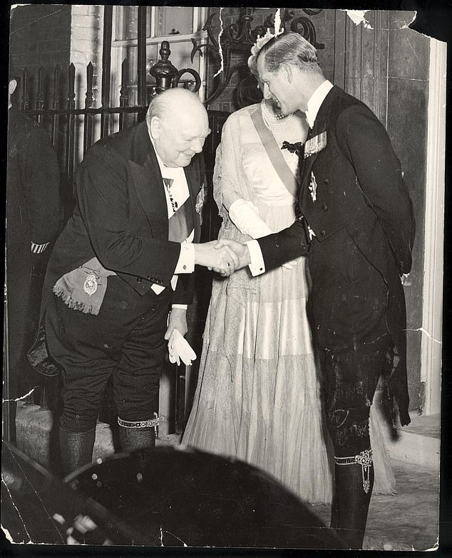 Prince Philip bids Churchill farewell outside Downing Street after dining with Queen Elizabeth