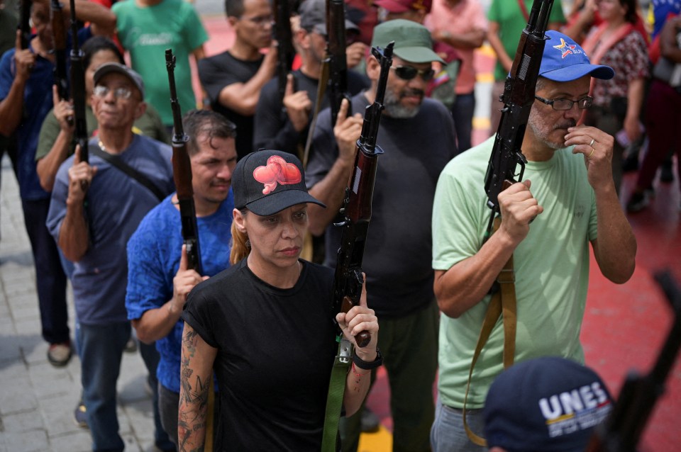Civilians training in weapons handling.