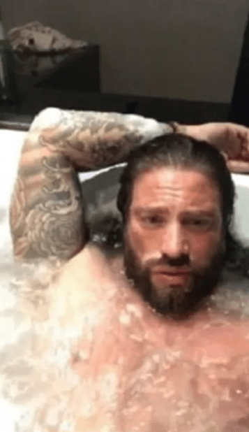 Chris Harkins, the Tinder Swindler, in a bathtub.