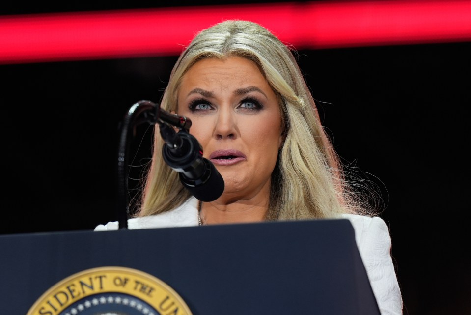 Erika Kirk speaking at a memorial for her husband, Charlie Kirk.