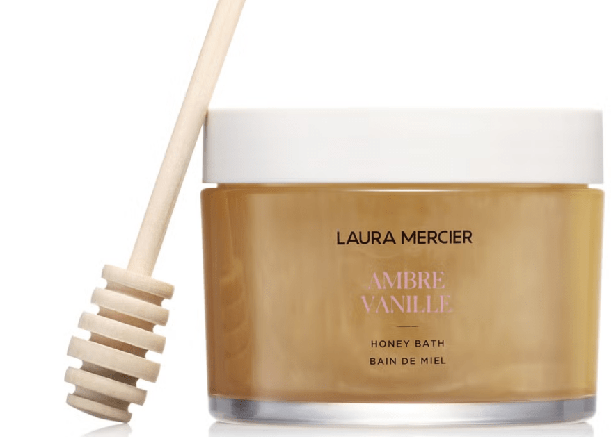Laura Mercier Ambre Vanille Honey Bath with a honey dipper.