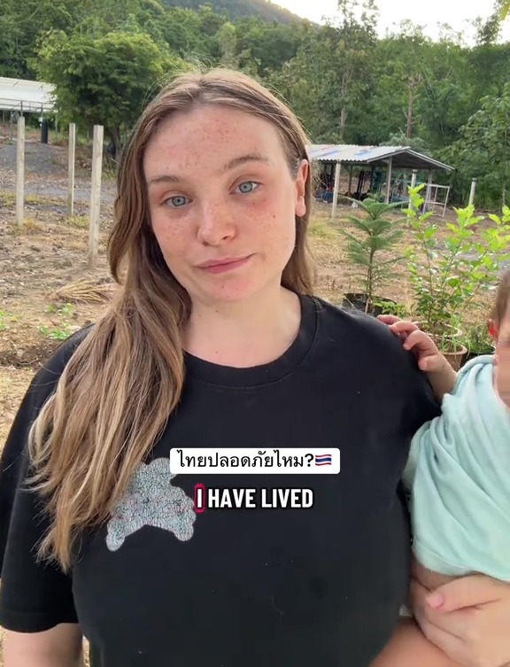 A woman with blue eyes and freckles with text, "IS THAILAND SAFE?" and "I HAVE LIVED" on screen.
