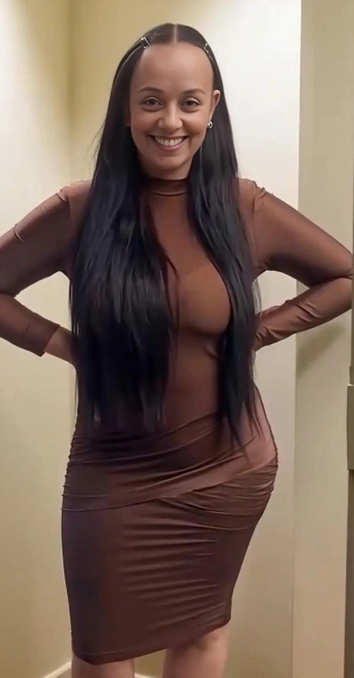 Woman in brown dress.