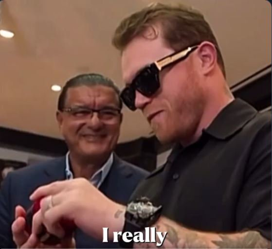 Canelo Alvarez looking at expensive watches.