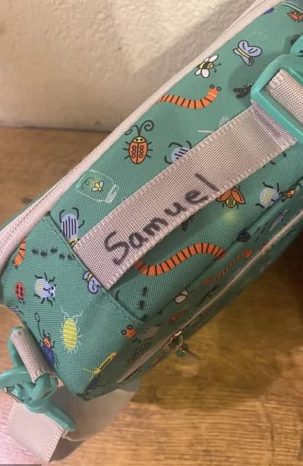 Child's lunchbox with "Samuel" written on the strap.