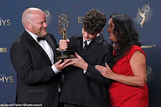Owen with his proud parents
