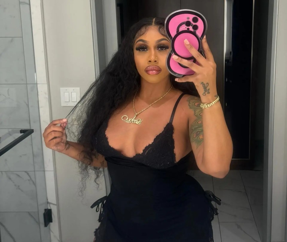 Selfie of Lola Doll in a black dress.