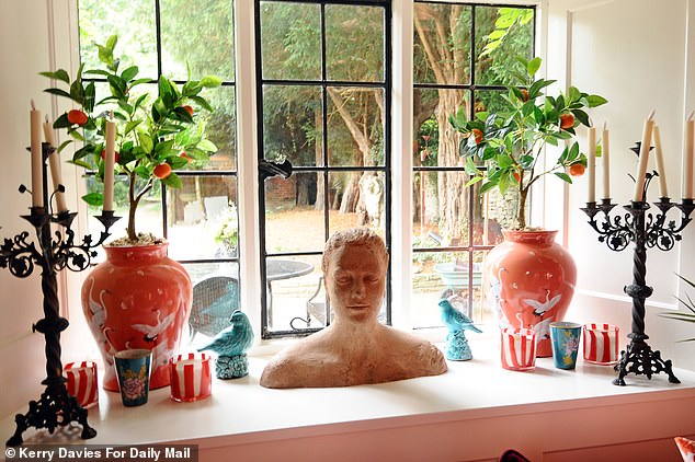 Every room is adorned with trinkets and memorabilia picked out by Laurence and his family