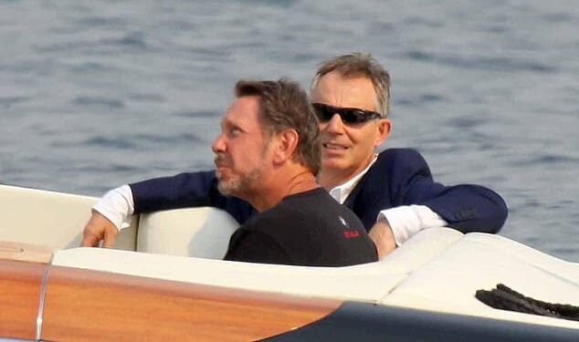 Former PM Tony Blair is seen on a boat with Larry Ellison, whose technology institute could make millions of pounds from Labour's controversial digital ID cards