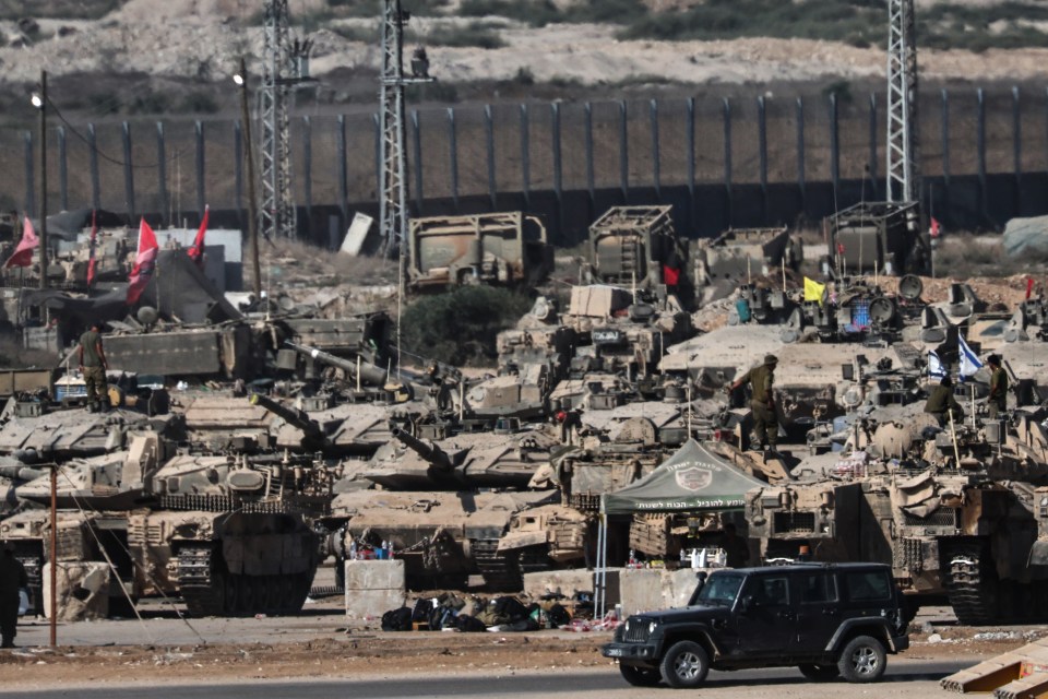 Israeli tanks deployed along the Israel-Gaza border.