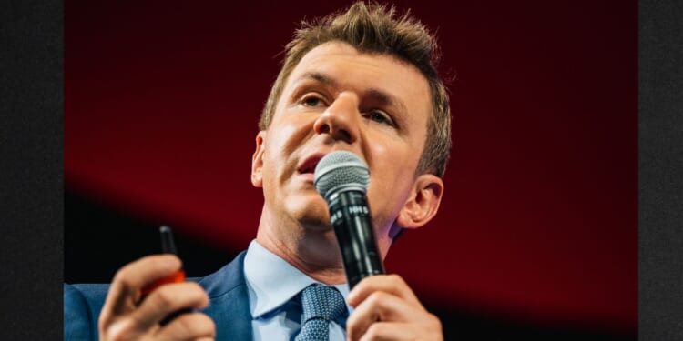 Investigative journalist James O'Keefe, seen in a 2021 photo, said Charlie Kirk challenged him to train college students to report on abuses at their college campuses.