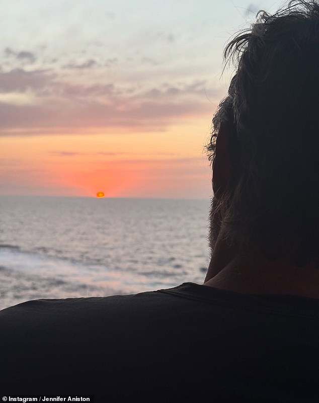Jennifer Aniston said goodbye to the summer yesterday with a selection of snaps, and the Mail can reveal that the mystery silhouette in one image is her boyfriend Jim Curtis