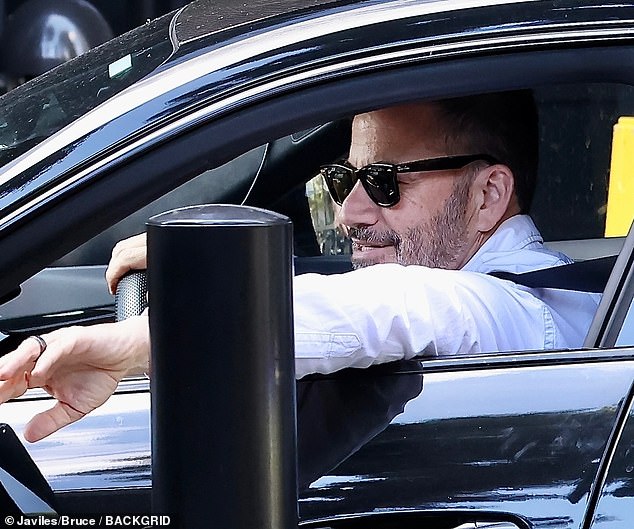 Ahead of the weekend Kimmel was spotted in the driver's seat of a black car, wearing a button-up white shirt and black sunglasses as he entered a medical plaza with security in tow