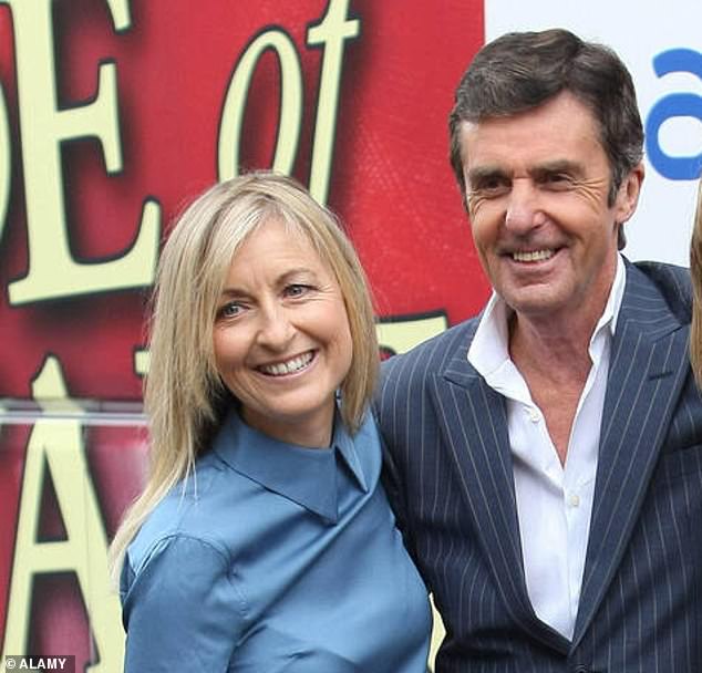 John, who also presented Newsnight and Panorama, passed away aged 79 on Sunday following a battle with Parkinson's disease (pictured with Fiona in 2012)