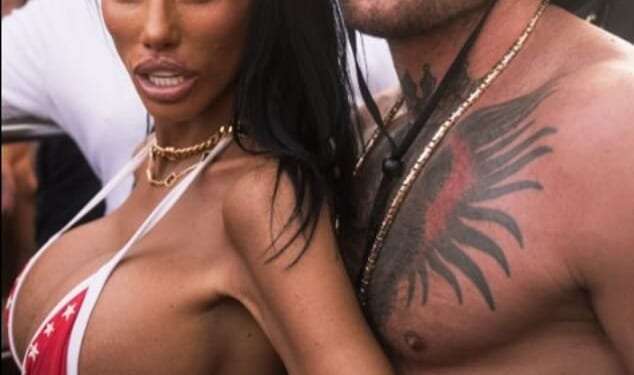 Katie Price and Conor McGregor pose for a photo together in Ibiza