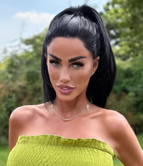 Katie Price wearing a green dress.