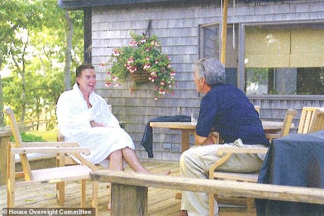 Lord Mandelson - who once infamously declared himself 'intensely relaxed about people getting filthy rich' - in a fluffy white dressing gown enjoying a chat with Jeffrey Epstein