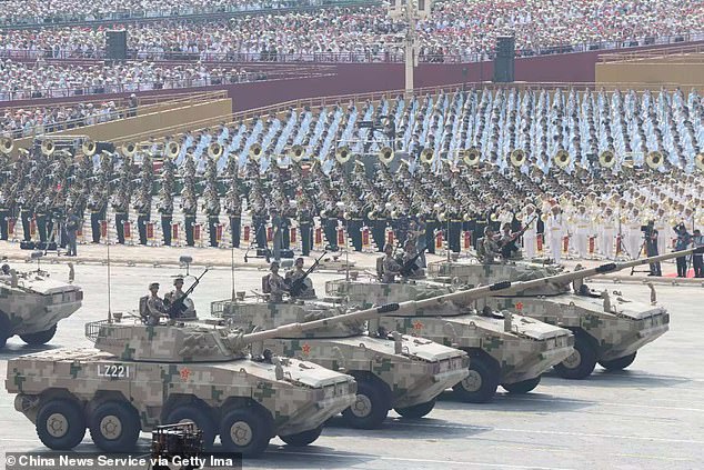 The ground assault formation passes through Tiananmen Square
