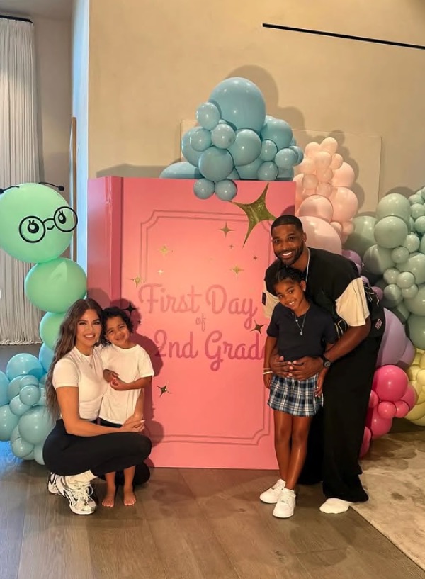 Khloe Kardashian and Tristan Thompson with their children celebrating the first day of 2nd grade.
