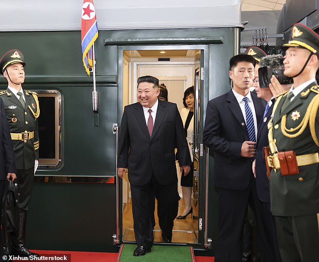 Kim Jong Un has arrived in Beijing in his armoured train to join Russia's Vladimir Putin and China's Xi Jinping for a huge military parade in Beijing as the three powers showcase their unity