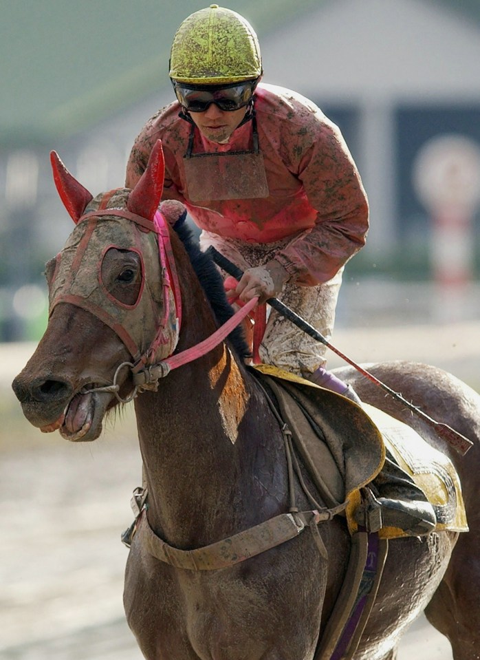 Jockey Yutaka Take riding Haru-urara.