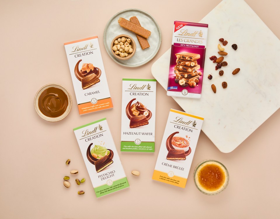 Five new Lindt Creation chocolate bars: Caramel, Hazelnut Wafer, Pistachio Delight, Crème Brûlée, and Les Grandes 34% Fruit & Nut.