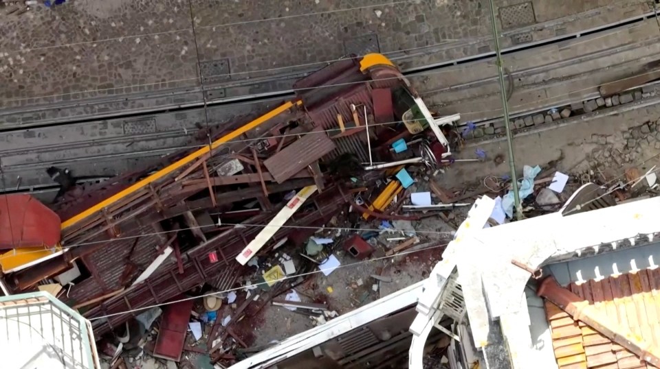 Drone view of a derailed funicular railway car.