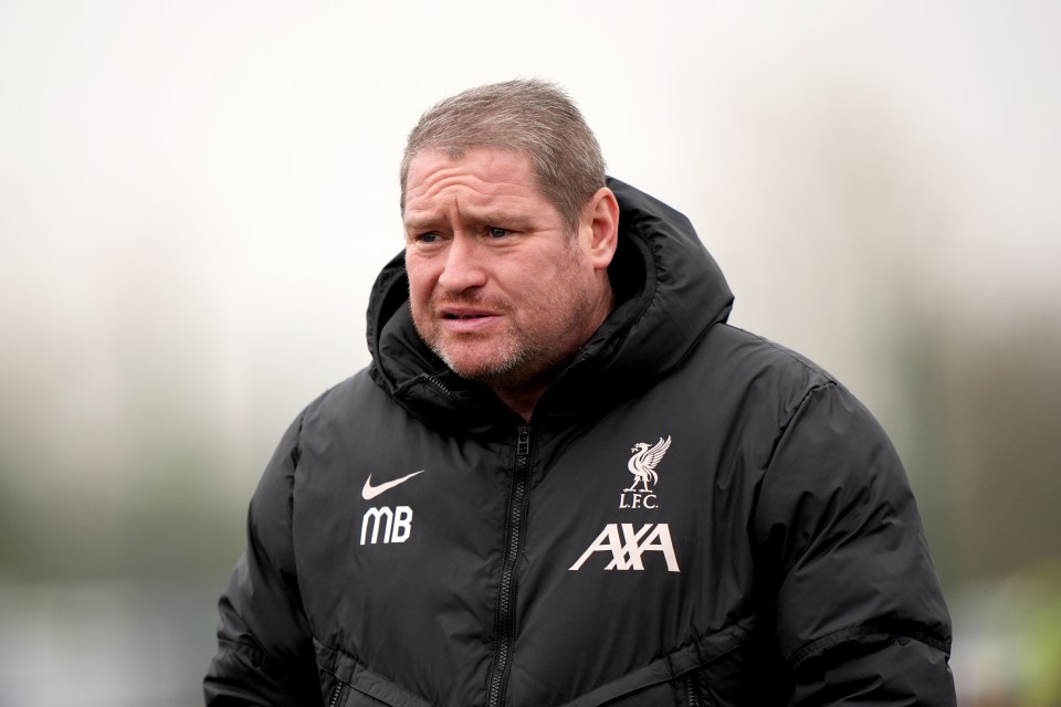 Matt Beard, former Liverpool women's team manager, wearing a black puffer jacket.