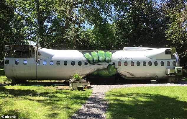 Britain's quirkiest Airbnb is an old Lufthansa aircraft that is split into two and contains 'economy' and 'first class' accommodation