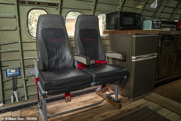 Original plane seats were then sourced and added to the former Dash 8 Q400 airliner