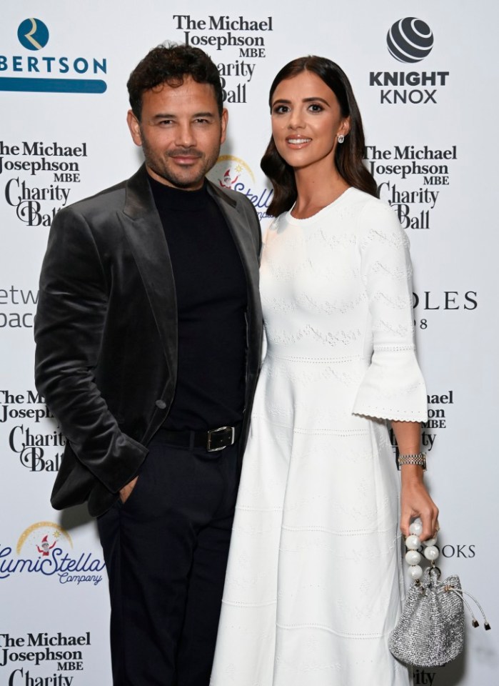Lucy Mecklenburgh and Ryan Thomas pose for pictures on the press boards at The Michael Josephson Charity Ball at The Hilton Hotel in Manchester Pictured: Lucy Mecklenburgh,Ryan Thomas Ref: SPL9996868 111123 NON-EXCLUSIVE Picture by: SplashNews.com Splash News and Pictures USA: 310-525-5808 UK: 020 8126 1009 eamteam@shutterstock.com World Rights,