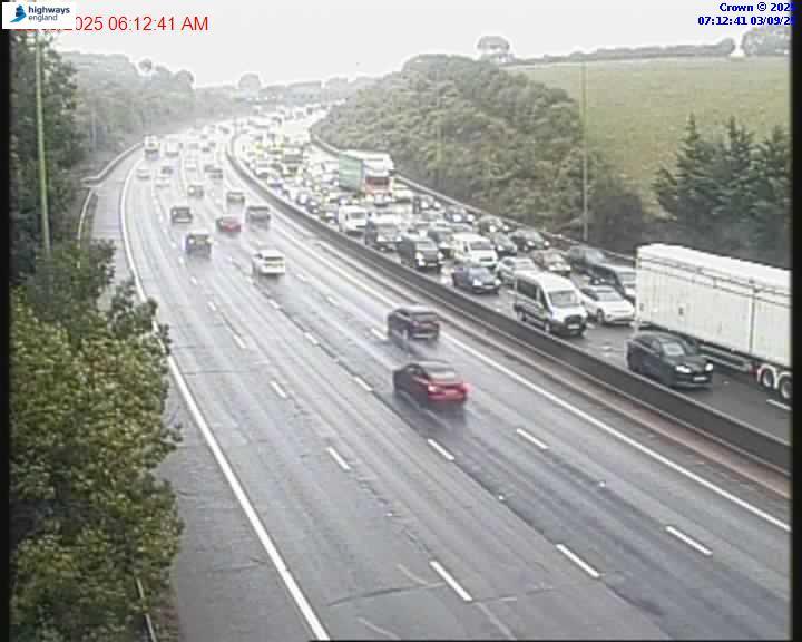 Traffic jam on a highway in the rain.