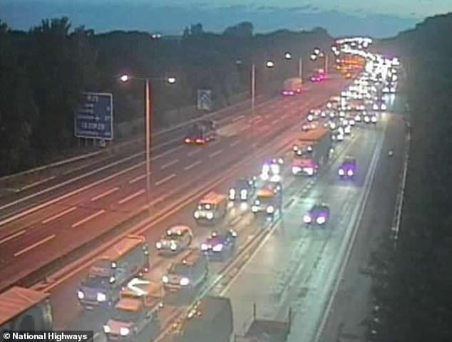 Motorists are stuck in huge standstill queues of traffic on the M25 this morning after a lorry crashed into a bridge