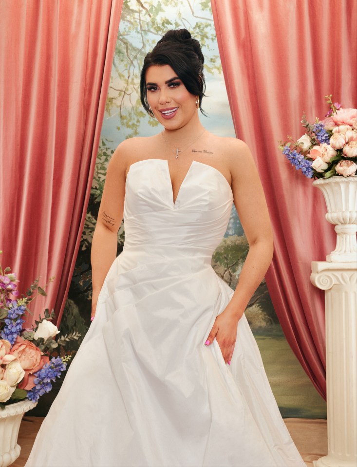 Maeve from Married at First Sight, in a white wedding gown, smiling at the camera.