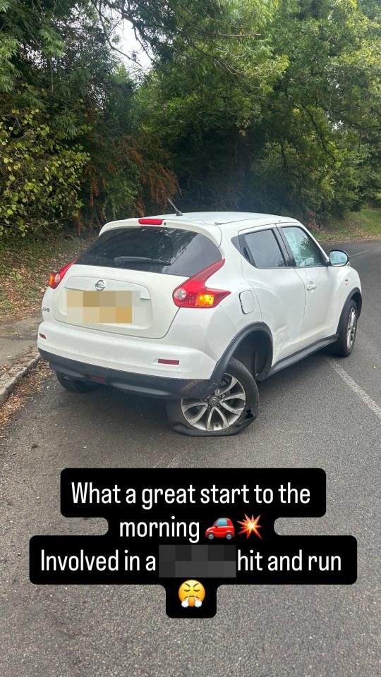 A white Nissan Juke with a blown-out rear tire.
