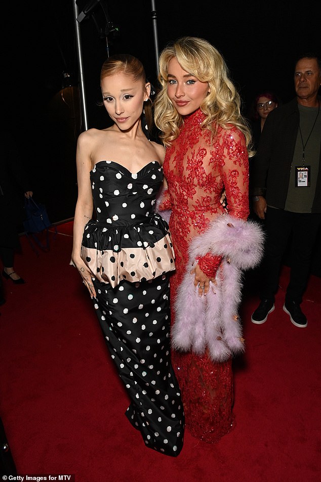 Ariana Grande has been accused of shading Sabrina Carpenter as an awkward encounter between them at the MVA Video Music Awards was caught on camera