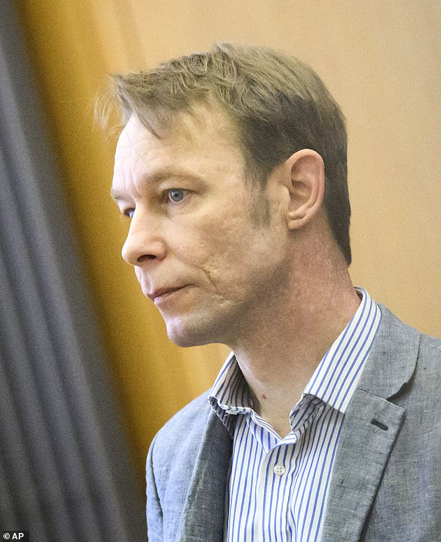 German law enforcement authorities have warned that the 'dangerous' chief suspect in the 2007 disappearance of British toddler Madeleine McCann will soon leave prison and could flee the country. Pictured: Chief suspect Christian Brueckner sits in the courtroom during his trial at Braunschweig Regional Court, in Brunswick, Germany, Wednesday, April 3, 2024