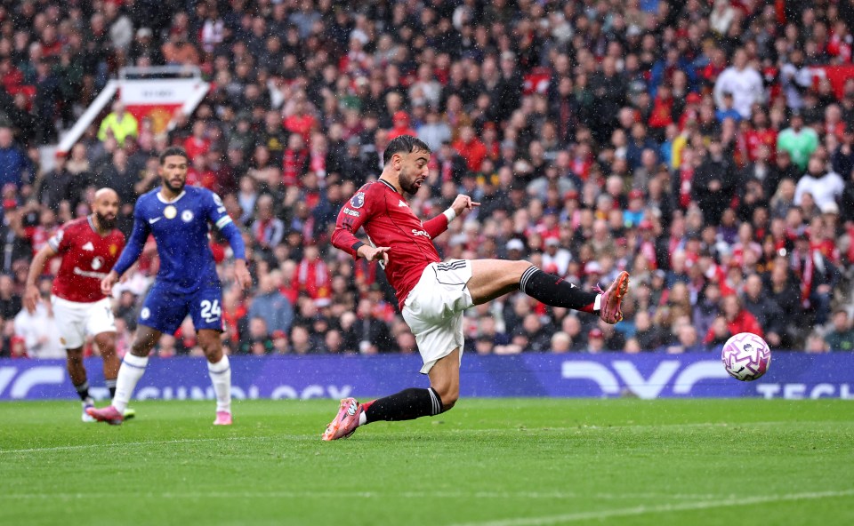 Bruno Fernandes of Manchester United scores his team's first goal against Chelsea.