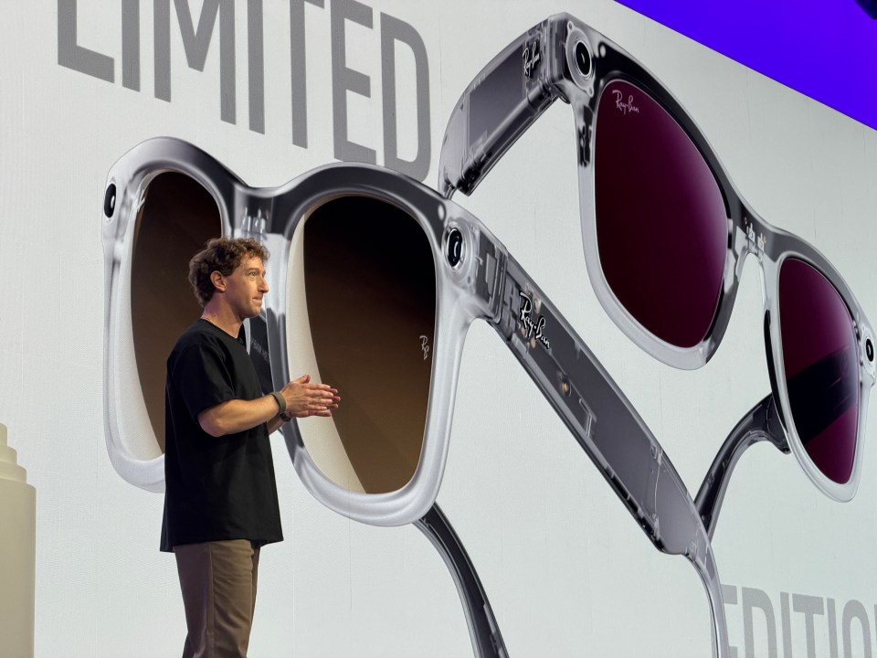 Mark Zuckerberg presenting new Ray-Ban Meta smart glasses on stage.