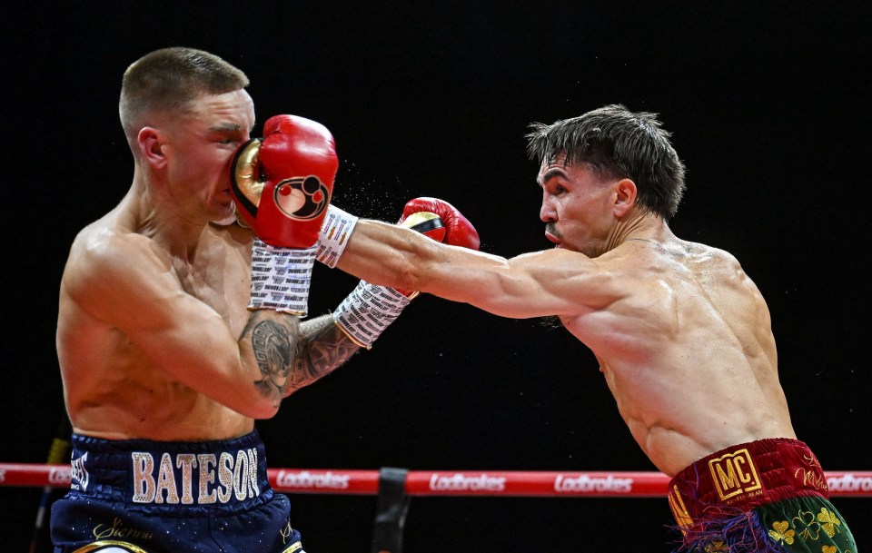 Michael Conlan landing a punch on Jack Bateson during a boxing match.