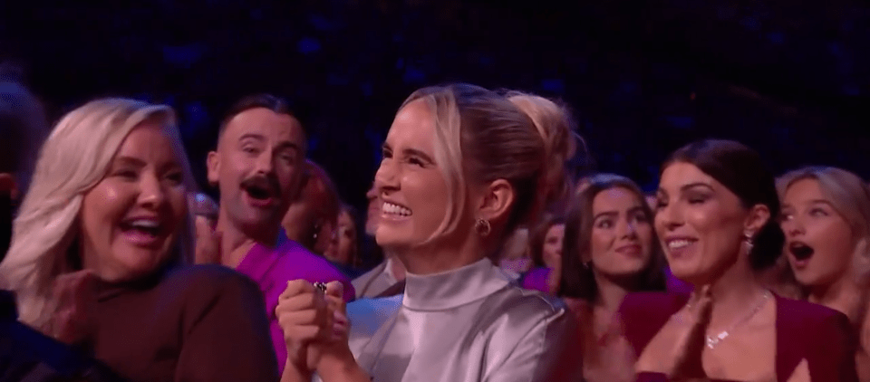 Screenshot of an audience reacting enthusiastically.