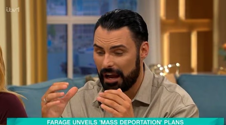 Rylan Clark speaking on a television show.
