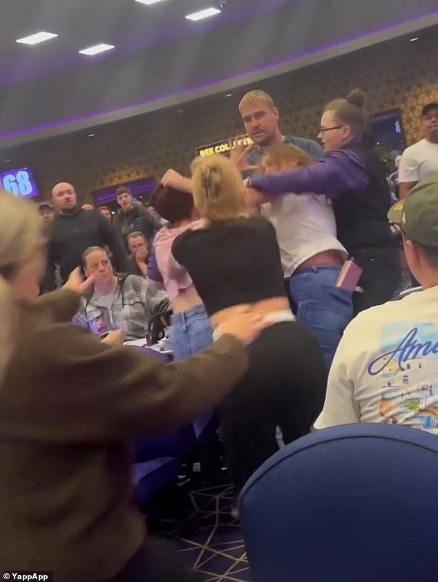 A group of women began grappling each other in the middle of the bingo hall before the full-scale brawl broke out