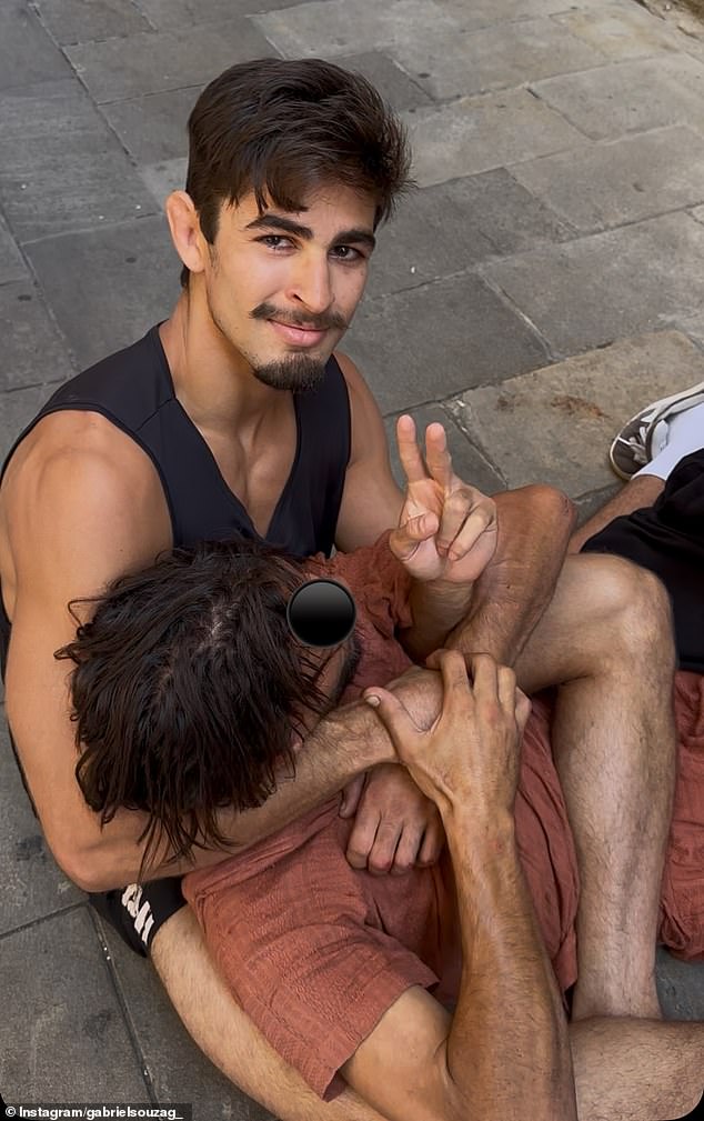 Gabriel Galindo poses for the camera after he and his brother helped arrest a thief who stole a chain from a Portuguese tourist in Barcelona last month