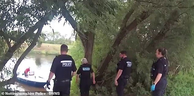 Police shouted at members of the public to run for cover while stranded on the wrong side of the river with no way of getting across