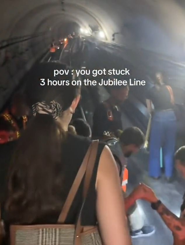 Tube passengers were forced to walk down the tracks after enduring the nightmarish ordeal of being stuck on a train for three hours