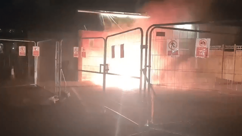 Flares near migrant hotel.