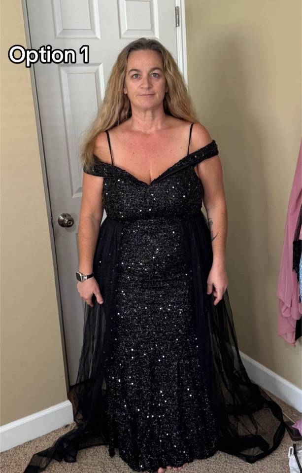 Woman trying on a black sequined off-the-shoulder gown with sheer black overlay and straps, labeled "Option 1."
